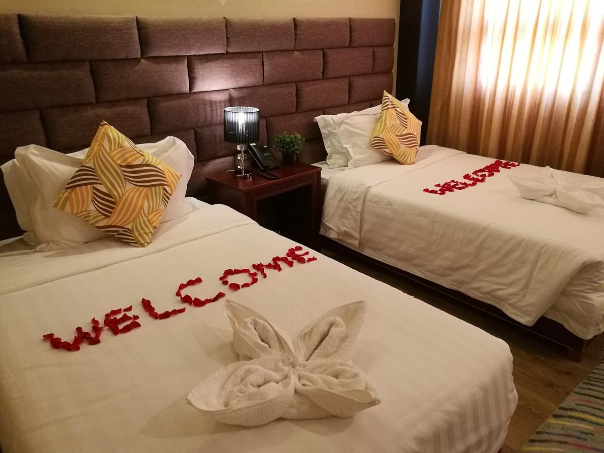 Great Wall Hotel ダル・エス・サラーム 部屋 写真